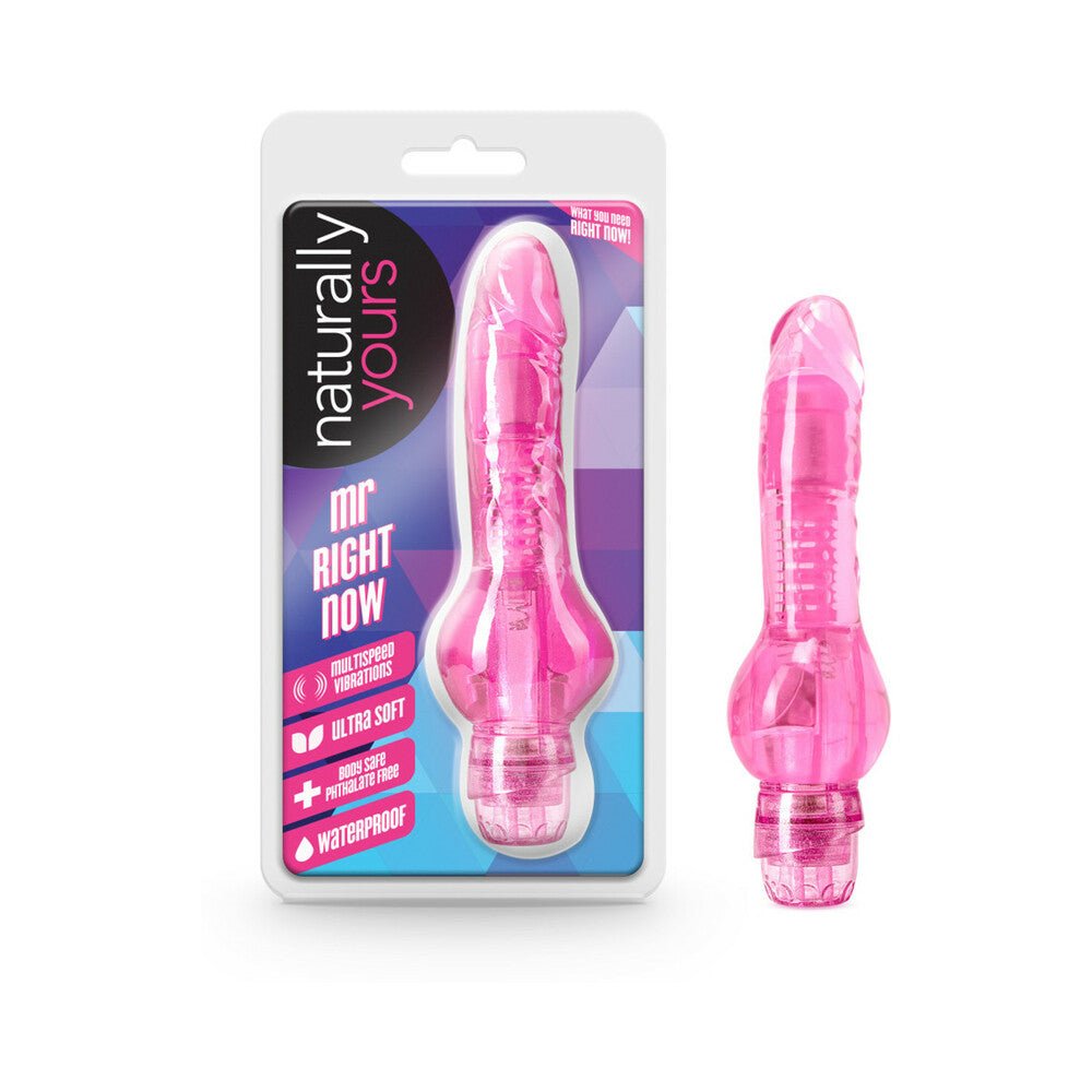 Hot pink realistic 6.5 inch vibrating dildo made of TPE, shown in packaging and beside it